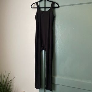 Ribbed body suit black size large fits like a medium. Never worn.